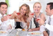 Cheap bottle of wine is eventually returned to original gift giver Dinner party group