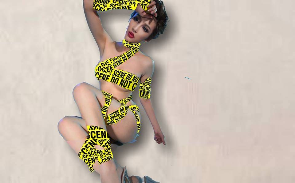 Nude woman wrapped in police tape