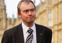 Tim Farron forced to hand over lunch money during visit to primary school Tim Farron