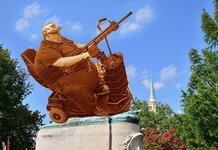 Robert E Lee statue replaced by bronze of obese man on mobility scooter holding semi-automatic rifle