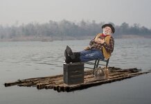 Climate Change is a hoax insists Texan on a raft