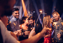 Couple looking forward to annual tedious night out, in dreadful nightclub with hideous people Clubbing